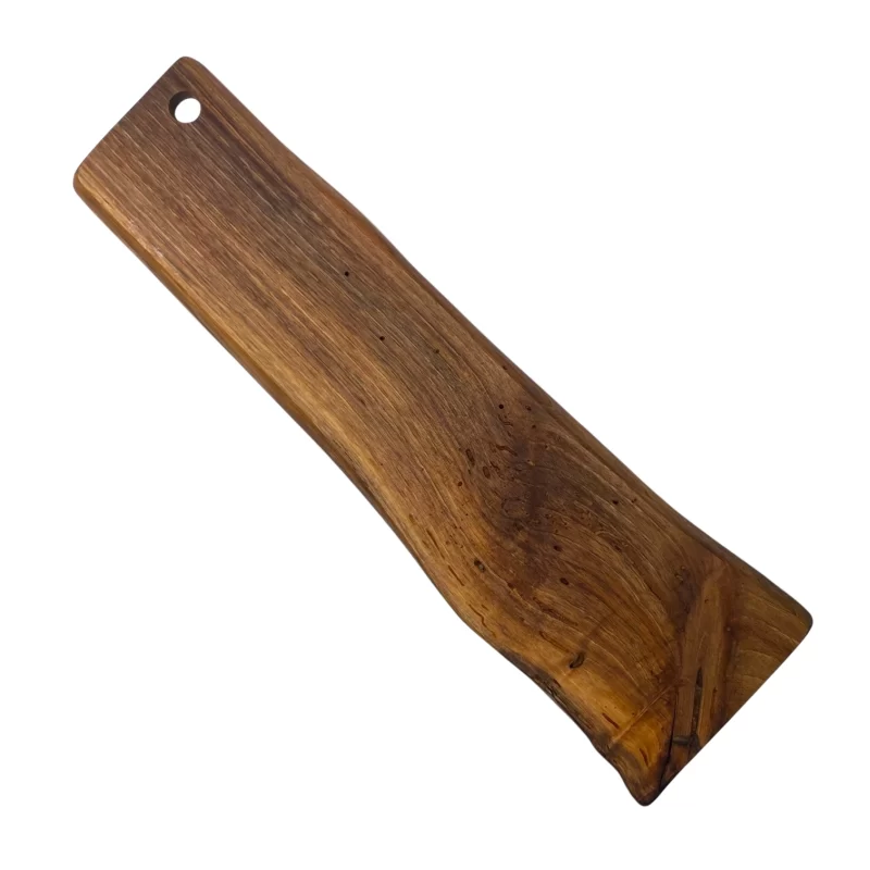 Irregular, narrow and long solid wood cutting board with a hanging hole, ideal for serving and cutting food in the kitchen.