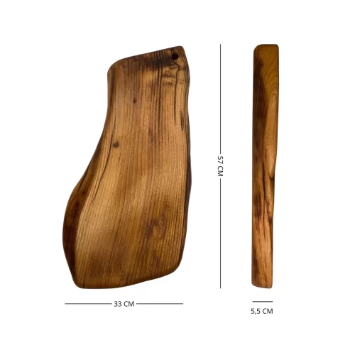 Irregular solid wood cutting board with hanging hole, ideal for serving and cutting food in the kitchen.