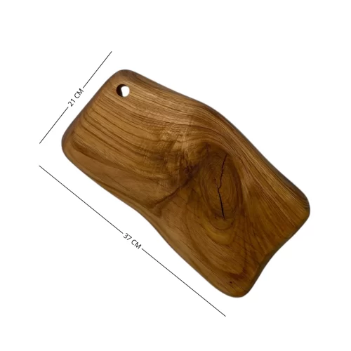 Irregular solid wood cutting board with hanging hole, ideal for serving and cutting food in the kitchen.