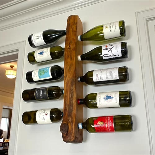 Handcrafted wooden wall-mounted bottle holder with irregular edge for 10 bottles of wine