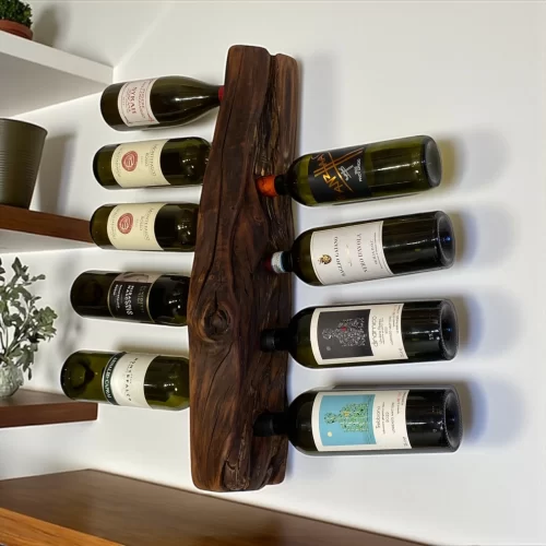 Handcrafted wooden wall-mounted bottle holder with irregular edge for 9 bottles of wine