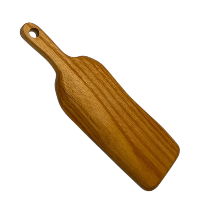 Tagliere artigianale in legno massello di quercia con manico, finitura naturale e venature eleganti
